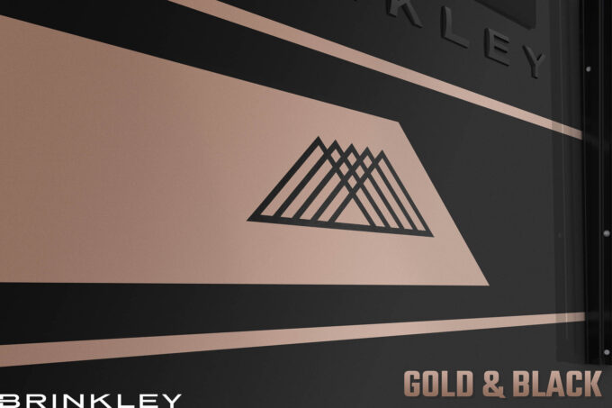 | Model Z Fifth Wheel Line 8 Model Z Fifth Wheels Premium Exterior Gold Black Full Body Paint Mountains 2026 Brinkley RV 0154L