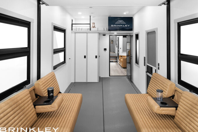 | Model G 4120 Toy Haulers 11 Interior view of Brinkley Model G garage sofas with armrests and cupholders in use.