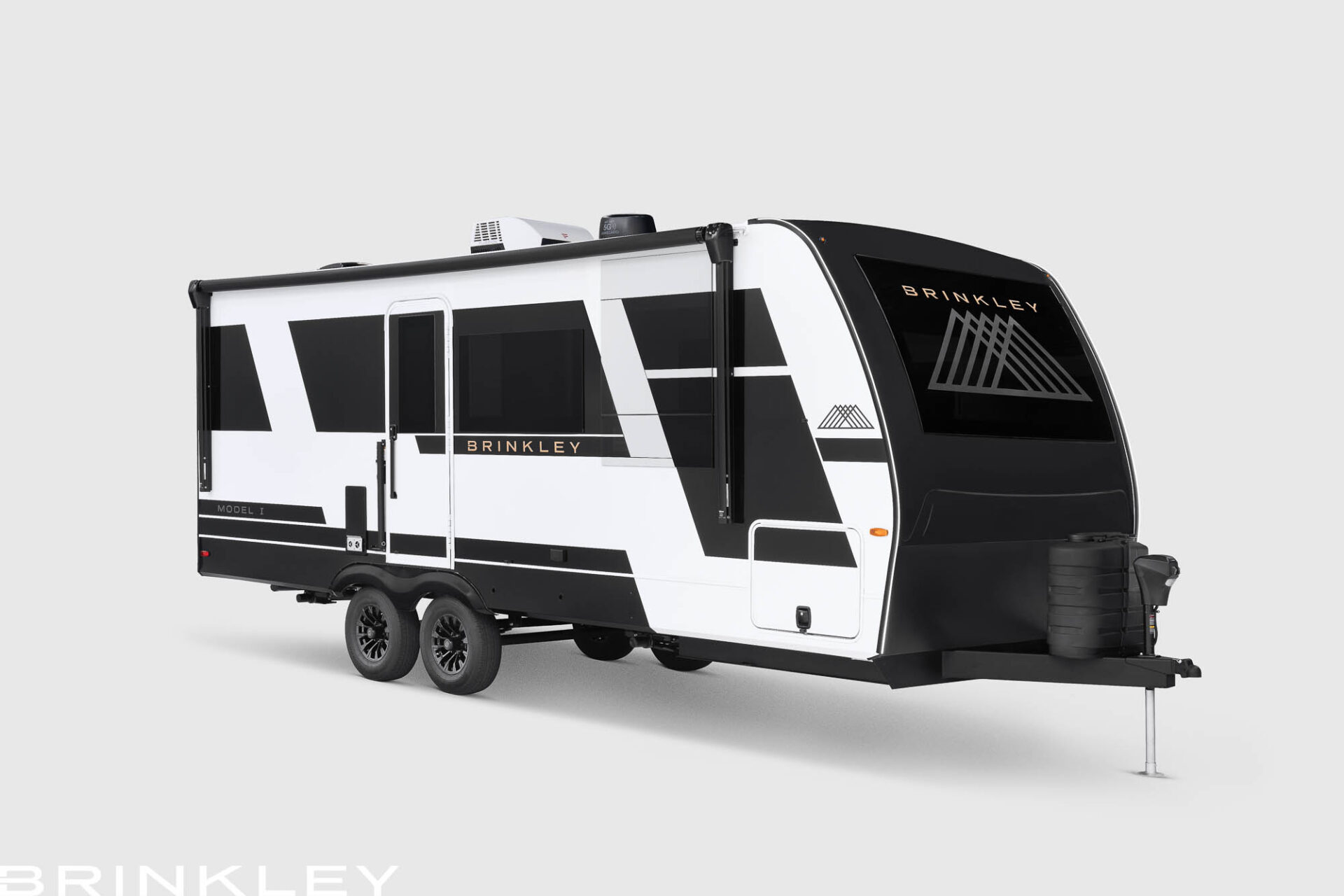| Model I Travel Trailer Line 13 Brinkley Model I RV with a modern automotive painted aluminum exterior built-to-last, shown against a clean white background.