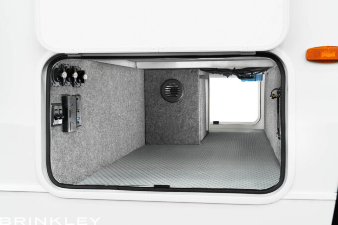 | Model Ix 24x Travel Trailers 53 Brinkley RV Model Ix 24x large pass-through storage featuring forced-air heat, insulated slam-latch doors, and anti-skid Tough-Ply flooring